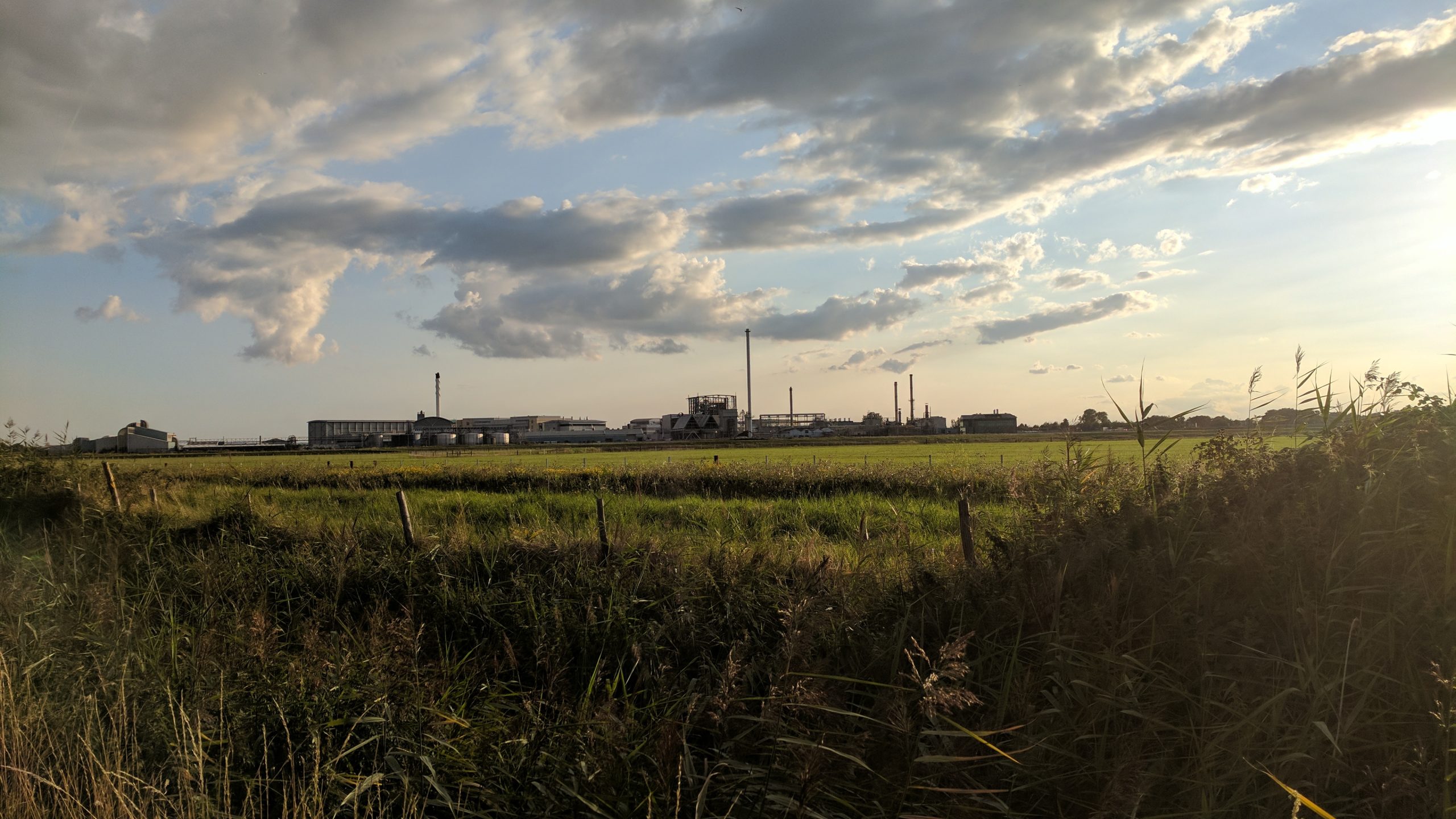 Sunset overlooking Industrial site